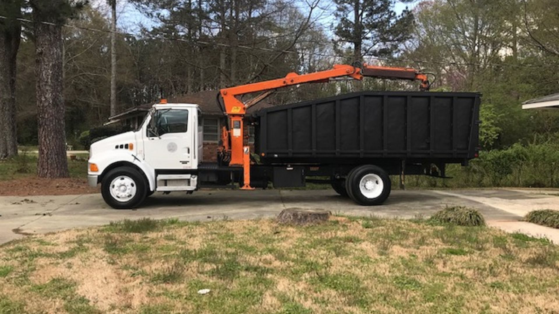 What Is Grapple Hauling and When Is It Better Than Traditional Junk Removal?